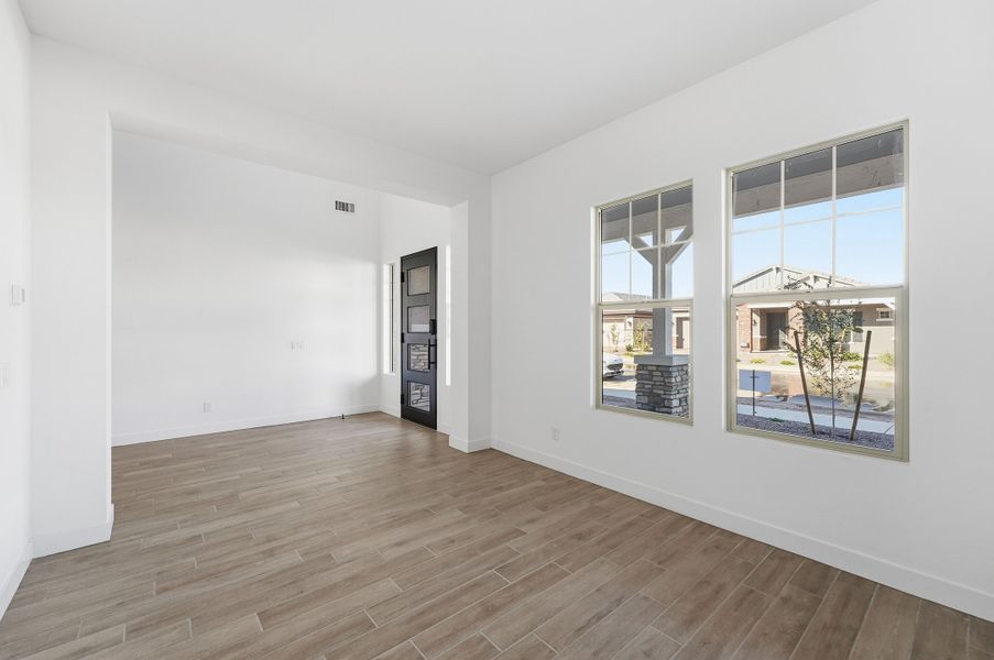 Spacious, unfurnished interior of a new home in Ellsworth Ranch, Queen Creek (Image 40).