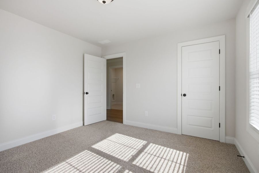 Spacious, unfurnished interior of a new home in Cherokee Knoll, Williamston (Image 32).