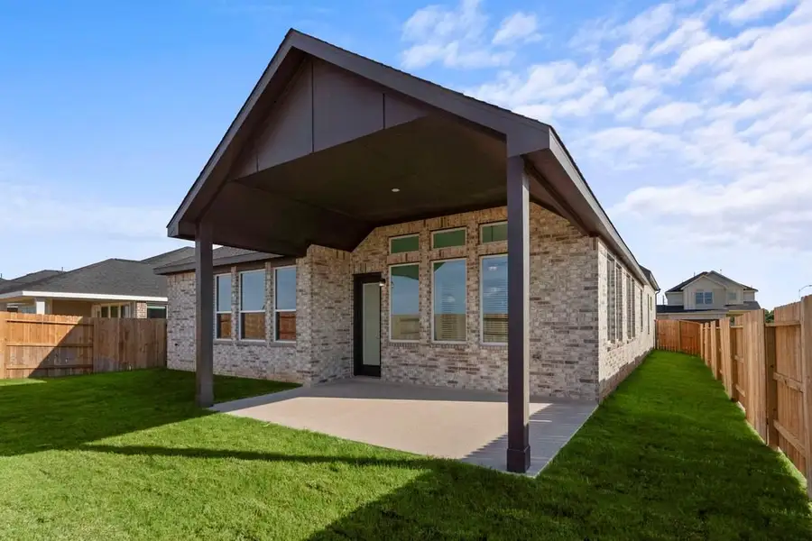 Exterior details and patio area of a home in Attwater, Waller (Image 3).