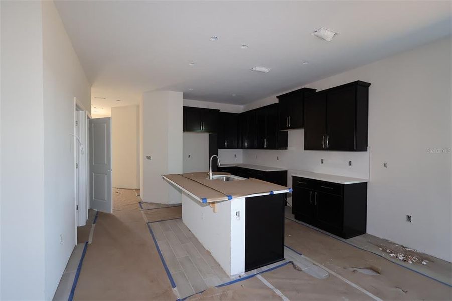 In-progress construction of a new home in Center Lake on the Park, St. Cloud, FL (Image 10).