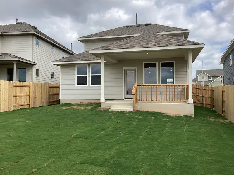 Exterior details and patio area of a home in Lariat, Liberty Hill (Image 3).