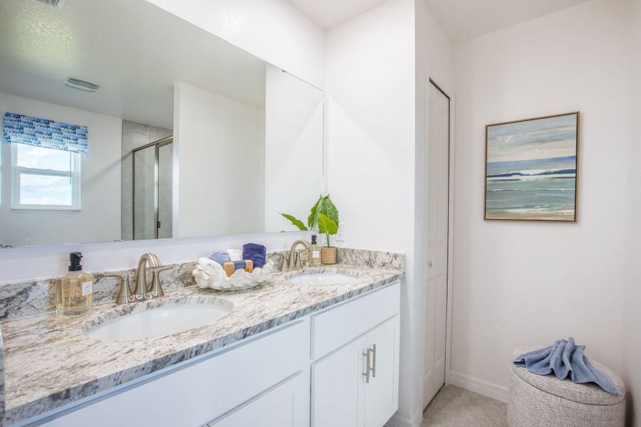 Representative furnished interior of a home built from the St Lucia by Maronda Homes in Orchid Cove, Bokeelia (Image 29).