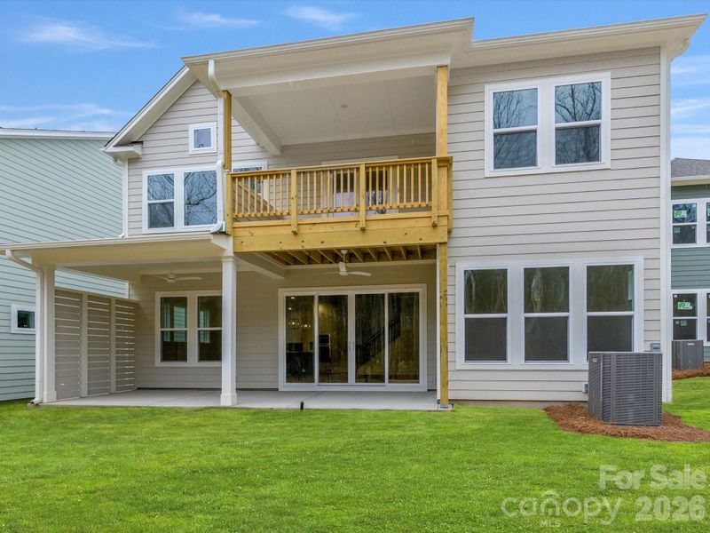 Exterior details and patio area of a home in North Creek Village, Huntersville (Image 24).