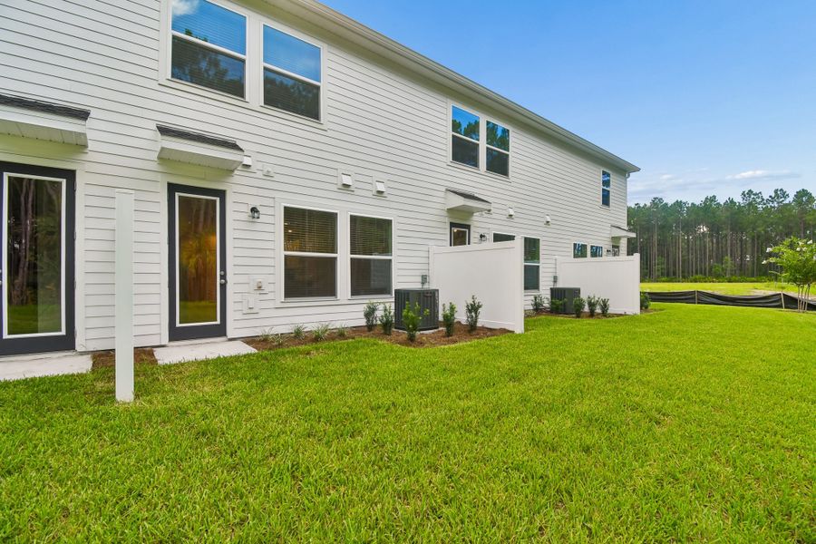 Exterior details and patio area of a home in Preserve at The Cays – The Harbor Series, Daytona Beach (Image 3).