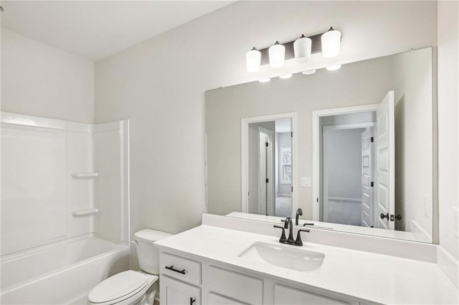 Furnished interior view inside a new home in Ponderosa Farms Manor, Gainesville (Image 12).