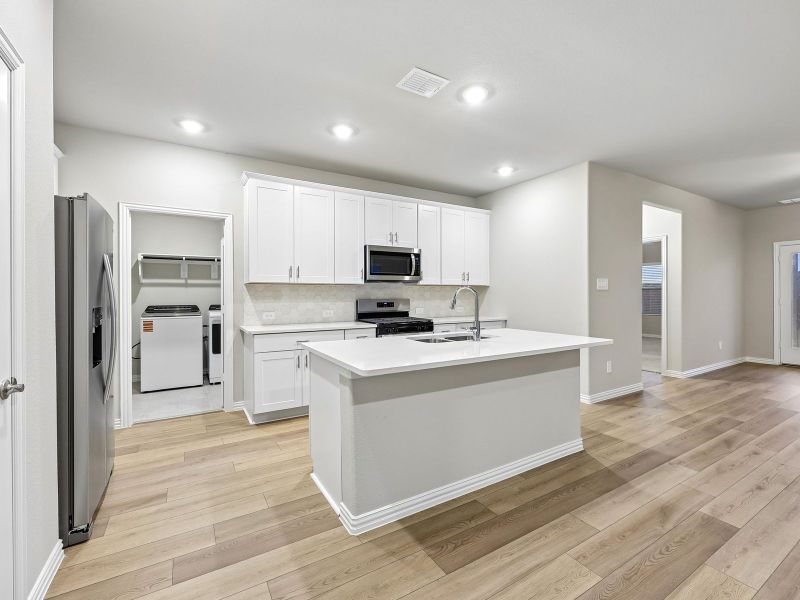 Furnished interior view inside a new home in Parks at Foster Crossing - Spring Series, Anna (Image 6). Furnished interior view inside a new home in Parks at Foster Crossing - Spring Series, Anna (Image 6).