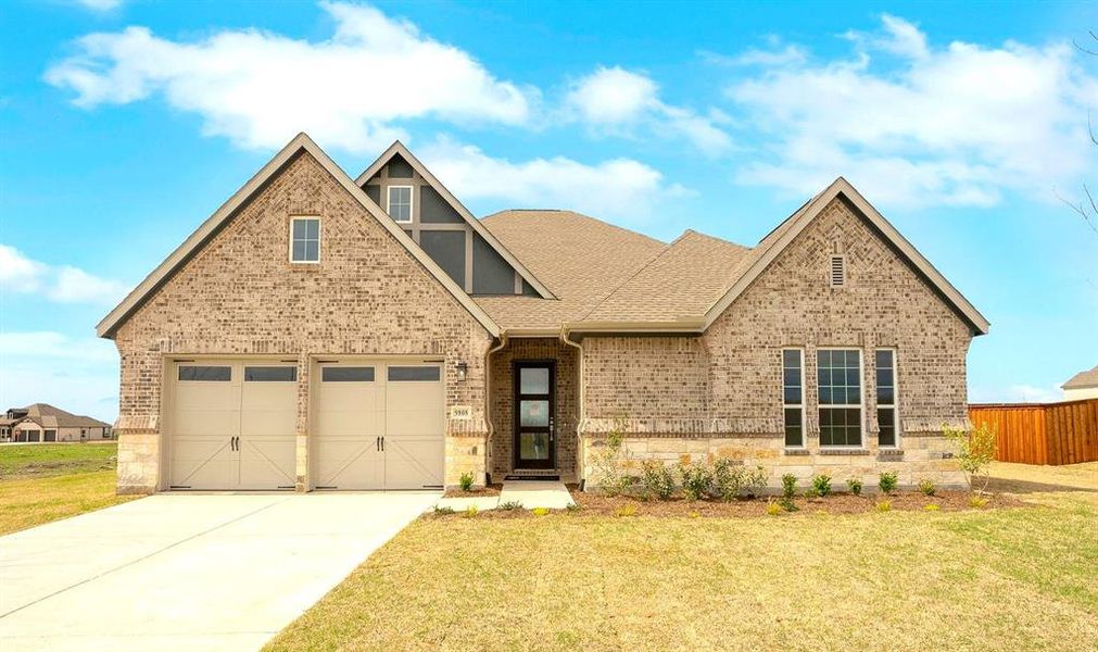 Front exterior of a new home in Polo Ridge, Mesquite, TX, highlighting curb appeal (Image 20). Front exterior of a new home in Polo Ridge, Mesquite, TX, highlighting curb appeal (Image 20).
