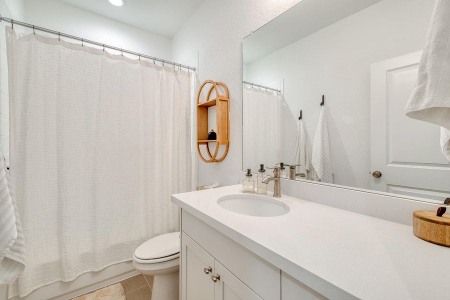 A full bath nearby makes this side of the upstairs especially convenient for guests.