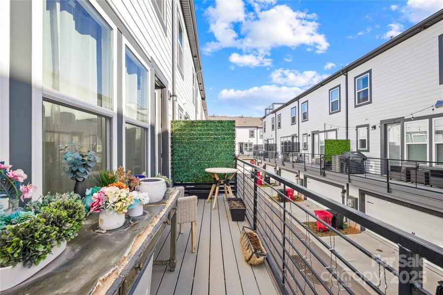 Exterior details and patio area of a home in Parkside Commons, Davidson (Image 3). Exterior details and patio area of a home in Parkside Commons, Davidson (Image 3).