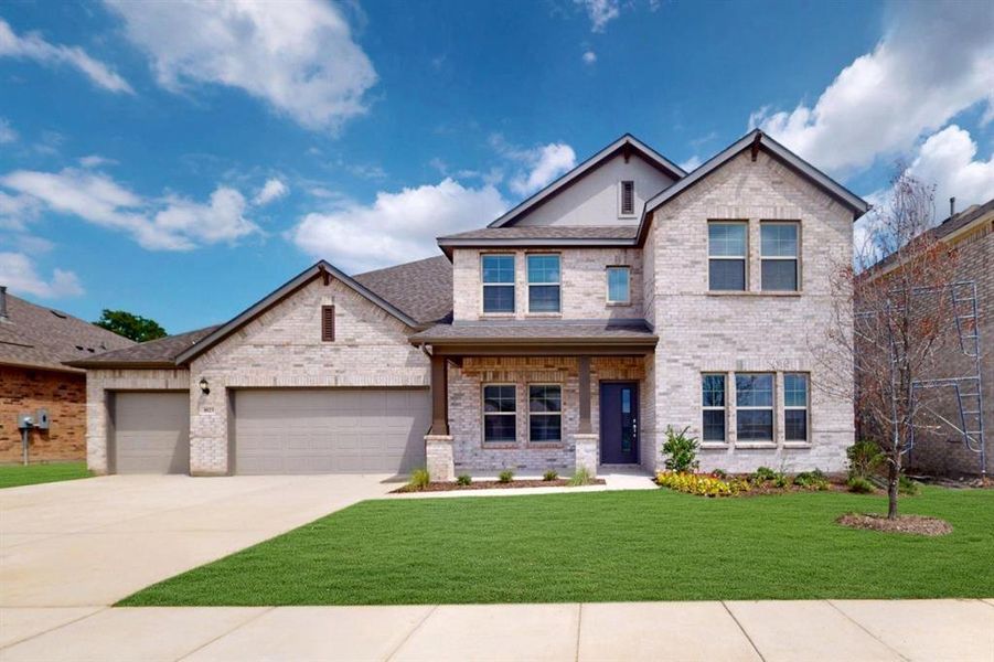 Front exterior of a new home in The Preserve, Justin, TX, highlighting curb appeal (Image 1).