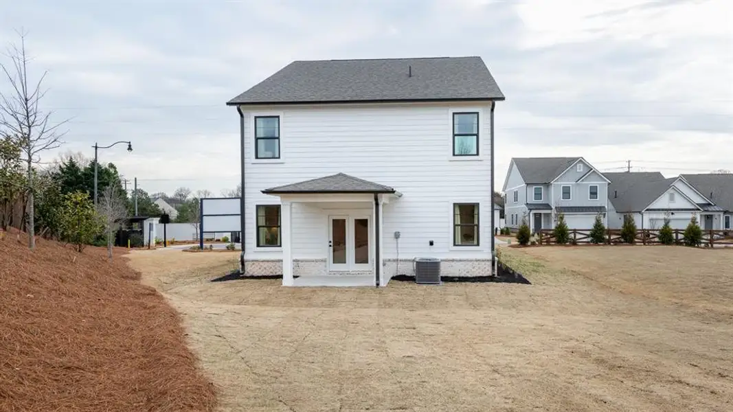 Exterior details and patio area of a home in The Village at Sandy Plains, Marietta (Image 3).