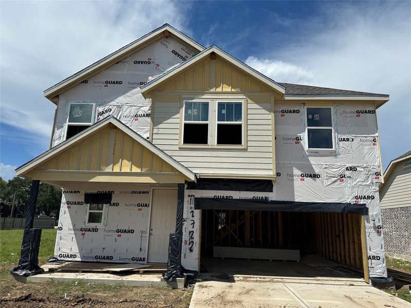 Front exterior of a new home in Ellis Cove, Seabrook, TX, highlighting curb appeal (Image 14).