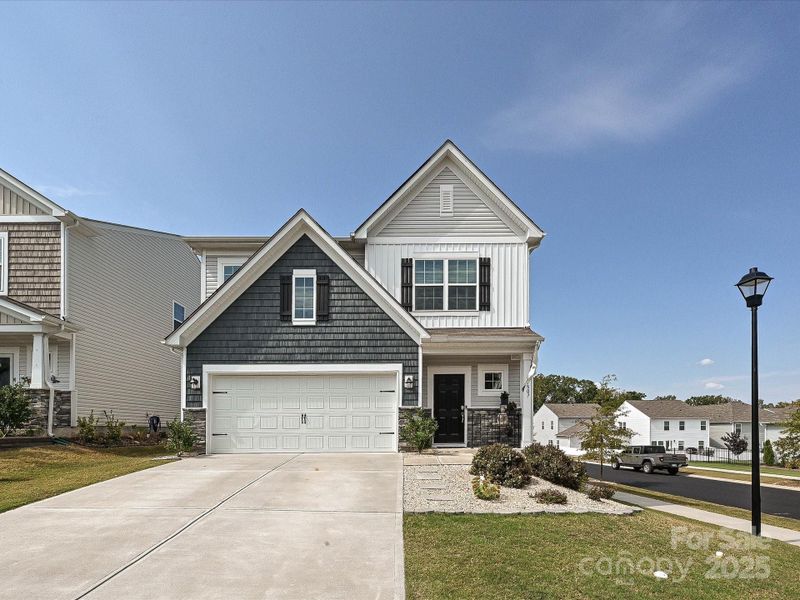 Front exterior of a new home in , Lancaster, SC, highlighting curb appeal (Image 2). Front exterior of a new home in , Lancaster, SC, highlighting curb appeal (Image 2).