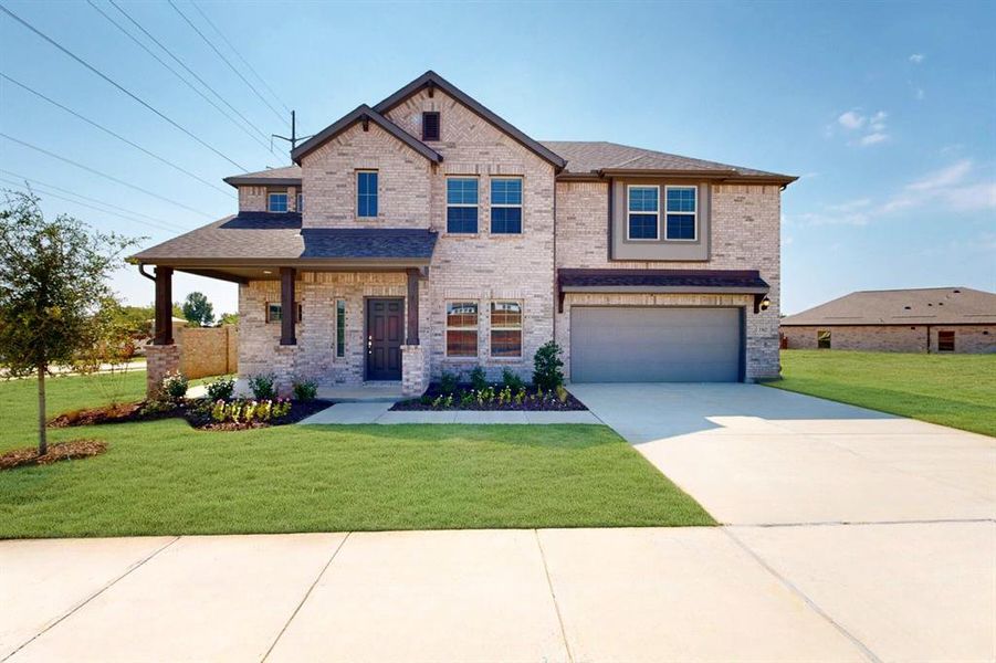 Front exterior of a new home in Kings Way, Denton, TX, highlighting curb appeal (Image 1).