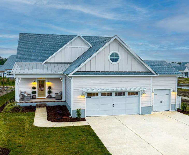 Representative exterior photo of a completed home built from the Willowbrook by Bill Clark Homes in Riverside Cove, Wilmington, NC (Image 24). Representative exterior photo of a completed home built from the Willowbrook by Bill Clark Homes in Riverside Cove, Wilmington, NC (Image 24).