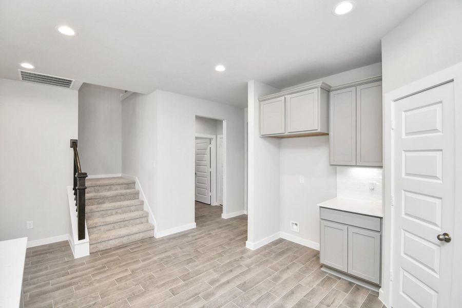 The open concept effortlessly connects the kitchen to the expansive family room, forming a perfect hub for gatherings. This seamless flow creates an inviting space where cooking and socializing come together harmoniously. The open concept effortlessly connects the kitchen to the expansive family room, forming a perfect hub for gatherings. This seamless flow creates an inviting space where cooking and socializing come together harmoniously.