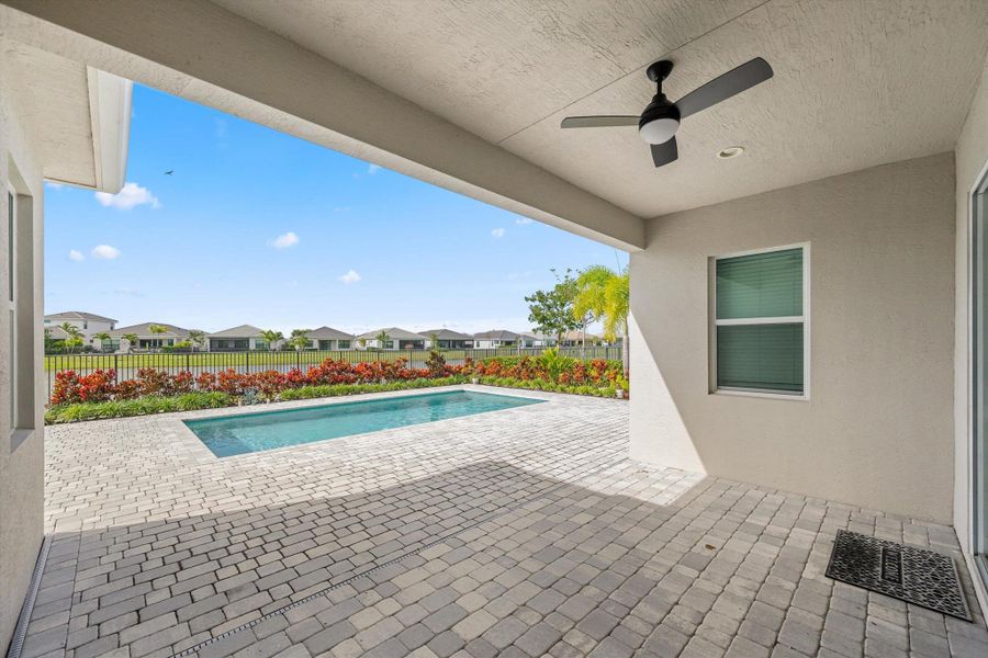 Exterior details and patio area of a home in , The Acreage (Image 23).