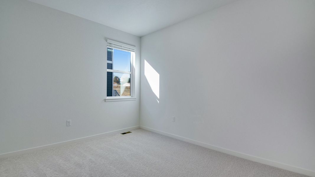 Spacious, unfurnished interior of a new home in Trails at Crowfoot, Parker (Image 23).