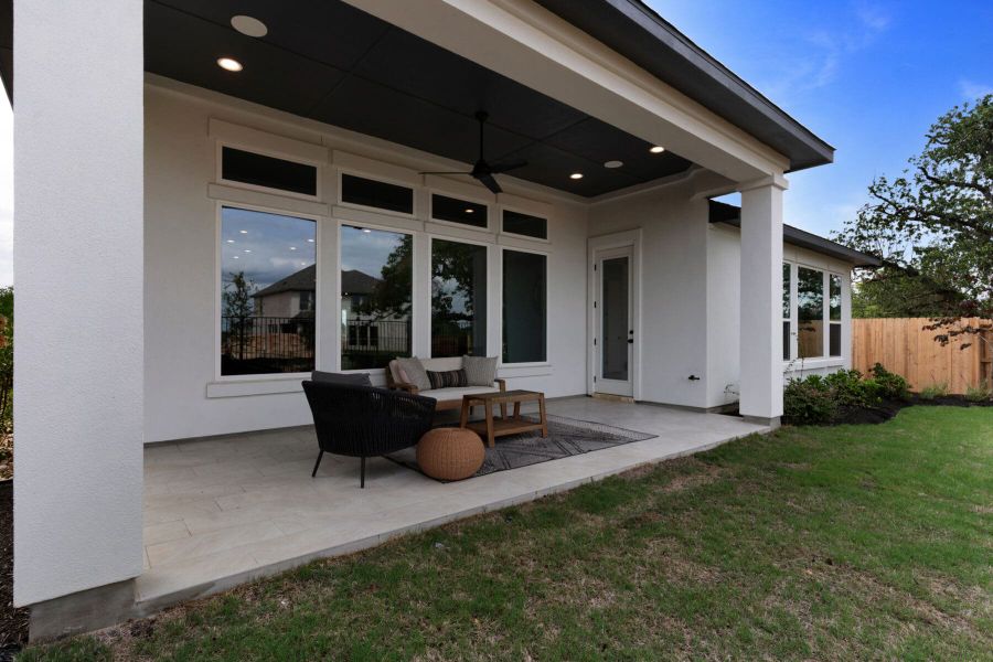 Exterior details and patio area of a home in The Colony- Pine Cove, Bastrop (Image 23).