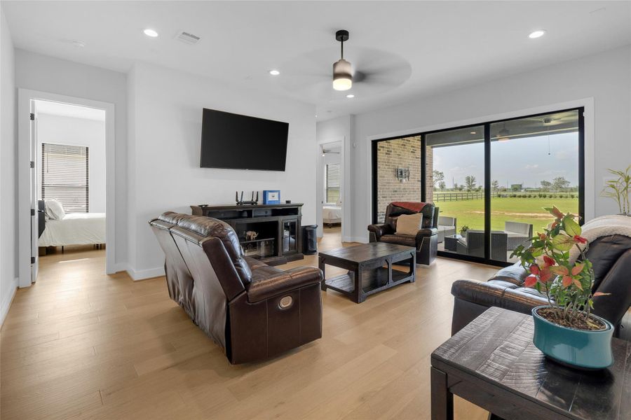 conveniently located additional room with flexible use options, perfect for a game room, hobby space, or family lounge.