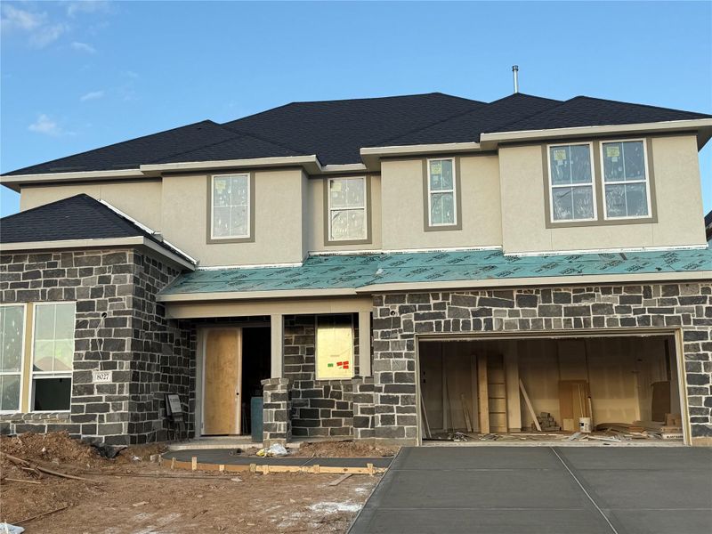 In-progress construction of a new home in The Orchard At Pecan Ridge, Fulshear, TX (Image 9).