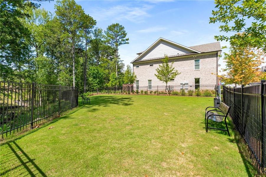 Front exterior of a new home in , Johns Creek, GA, highlighting curb appeal (Image 24). Front exterior of a new home in , Johns Creek, GA, highlighting curb appeal (Image 24).