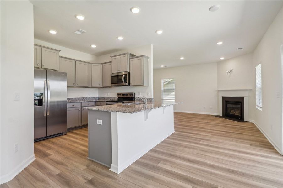 This bright, open concept living area blends moder This bright, open concept living area blends moder