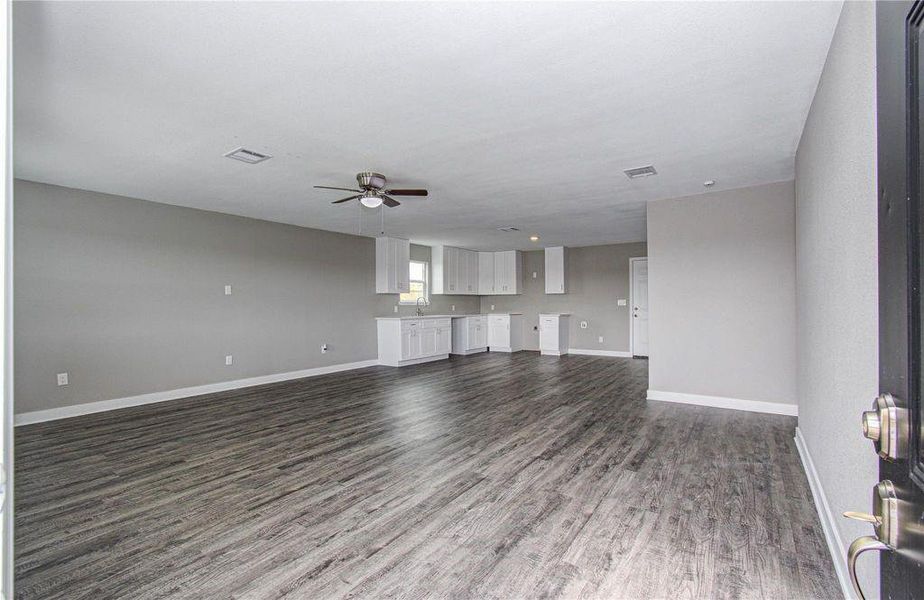 Open-concept living and kitchen area.