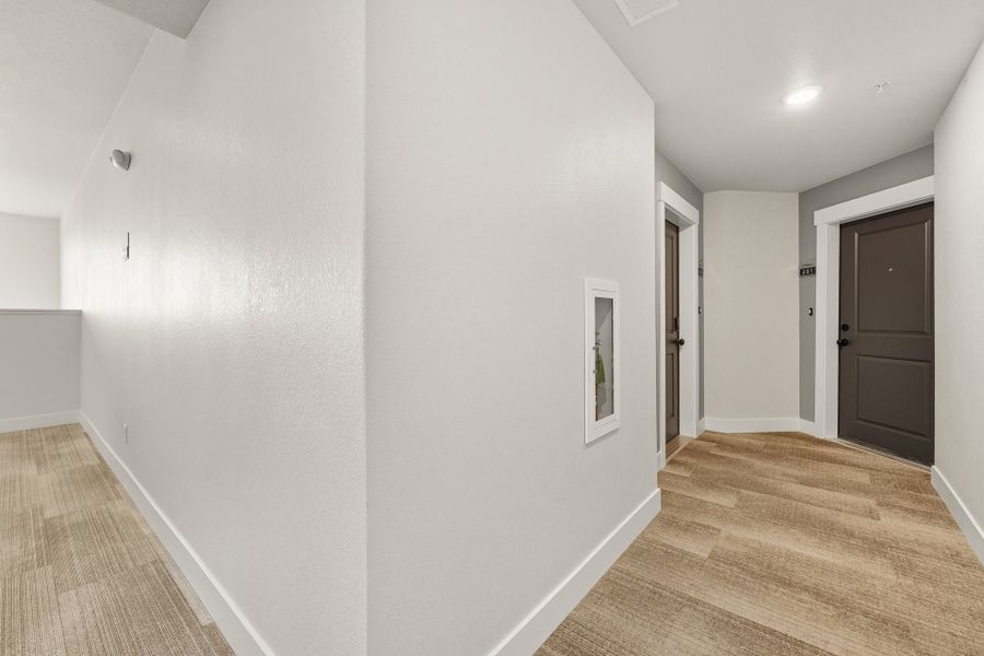 Spacious, unfurnished interior of a new home in The Lakes at Centerra, Loveland (Image 15). Spacious, unfurnished interior of a new home in The Lakes at Centerra, Loveland (Image 15).