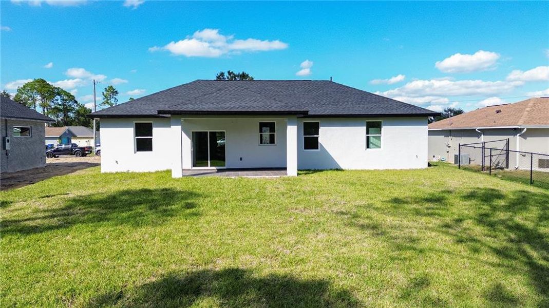 Exterior details and patio area of a home in , Sebring (Image 18). Exterior details and patio area of a home in , Sebring (Image 18).