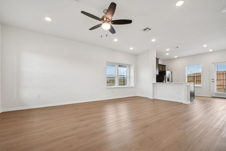 Spacious, unfurnished interior of a new home in Whisper Valley, Manor (Image 25).