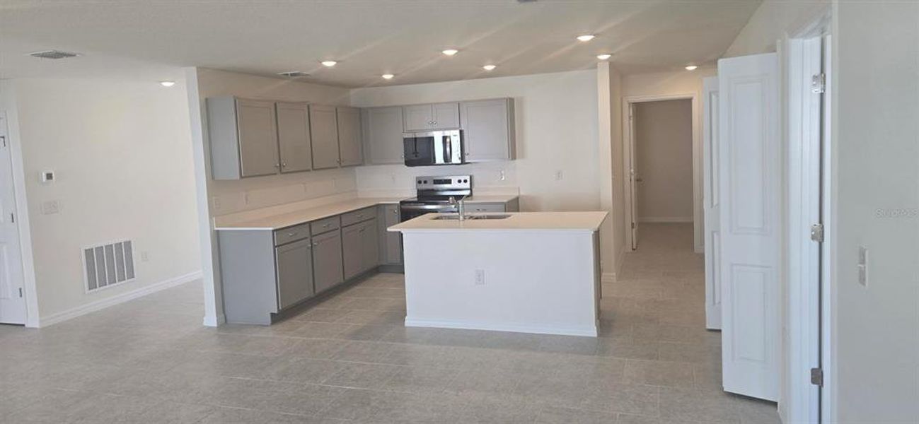 Furnished interior view inside a new home in , Poinciana (Image 7). Furnished interior view inside a new home in , Poinciana (Image 7).