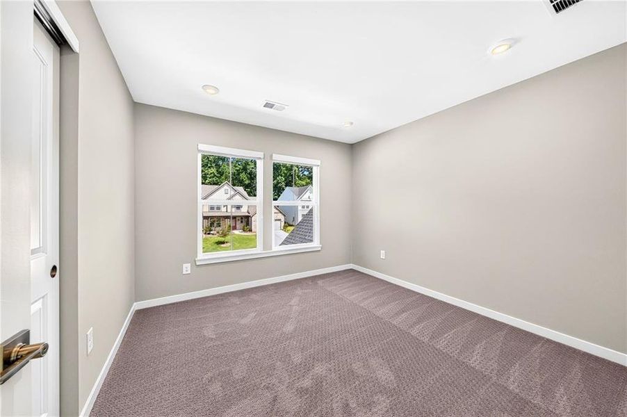 Spacious, unfurnished interior of a new home in The Reserve At Liberty Park, Braselton (Image 39).