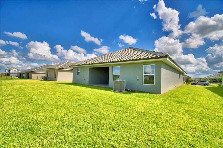 Exterior details and patio area of a home in , Auburndale (Image 28).