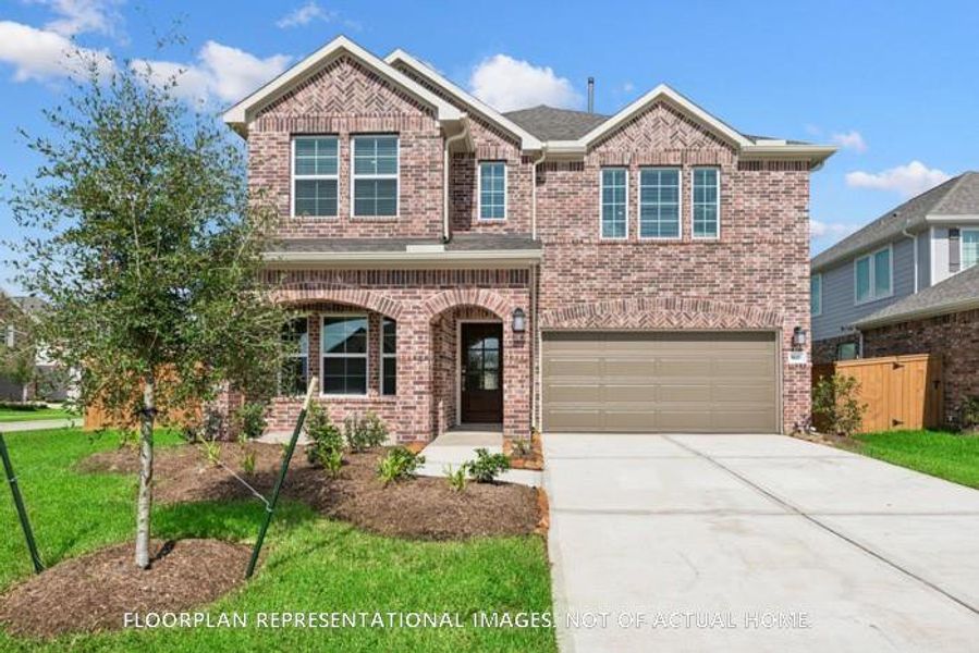 Front exterior of a new home in Moran Ranch, Willis, TX, highlighting curb appeal (Image 2). Front exterior of a new home in Moran Ranch, Willis, TX, highlighting curb appeal (Image 2).