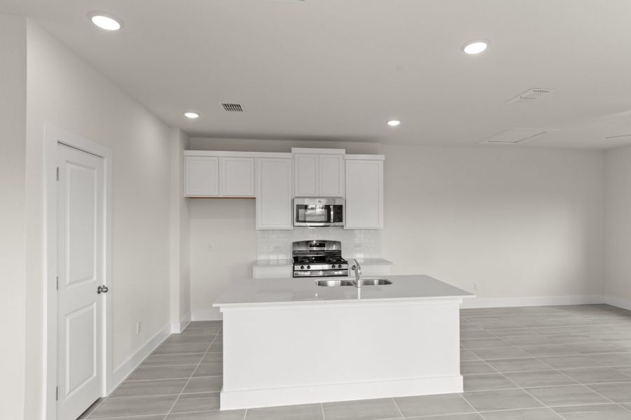 Representative furnished interior of a home built from the Colorado by Pacesetter Homes in Saddle Creek Twinhomes, Georgetown (Image 12).