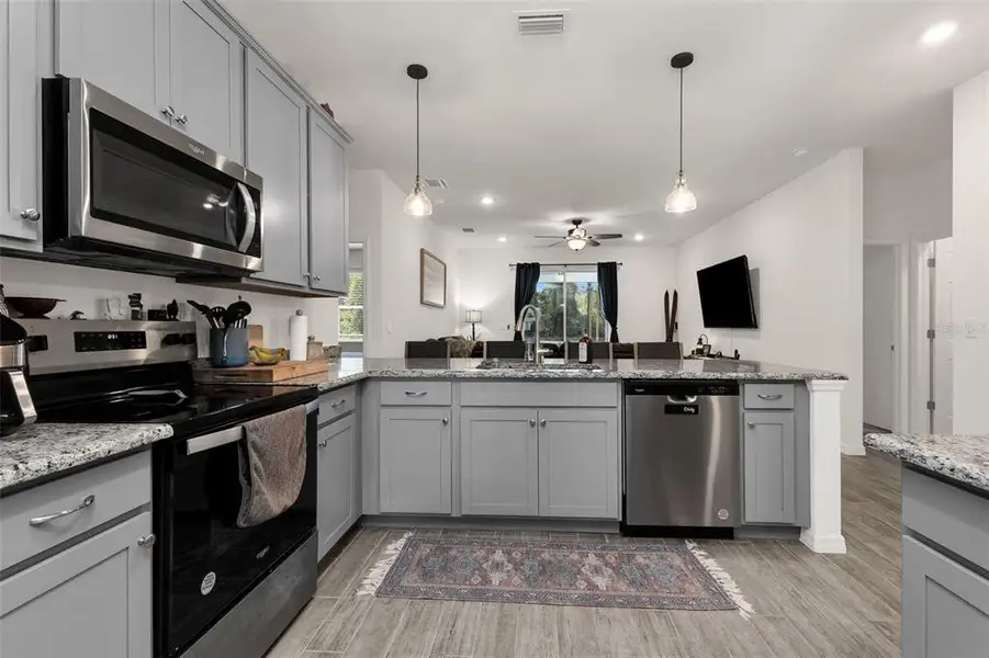 Furnished interior view inside a new home in , Port Charlotte (Image 16).