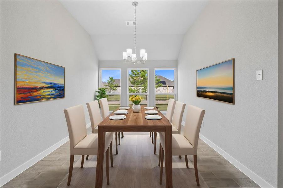 Make memories gathered around the table with your family and friends! This dining room features high ceilings, custom paint, gorgeous flooring, large windows and chandelier.