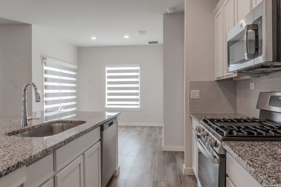Furnished interior view inside a new home in The Meadows at Hunters Ranch, San Antonio (Image 7). Furnished interior view inside a new home in The Meadows at Hunters Ranch, San Antonio (Image 7).