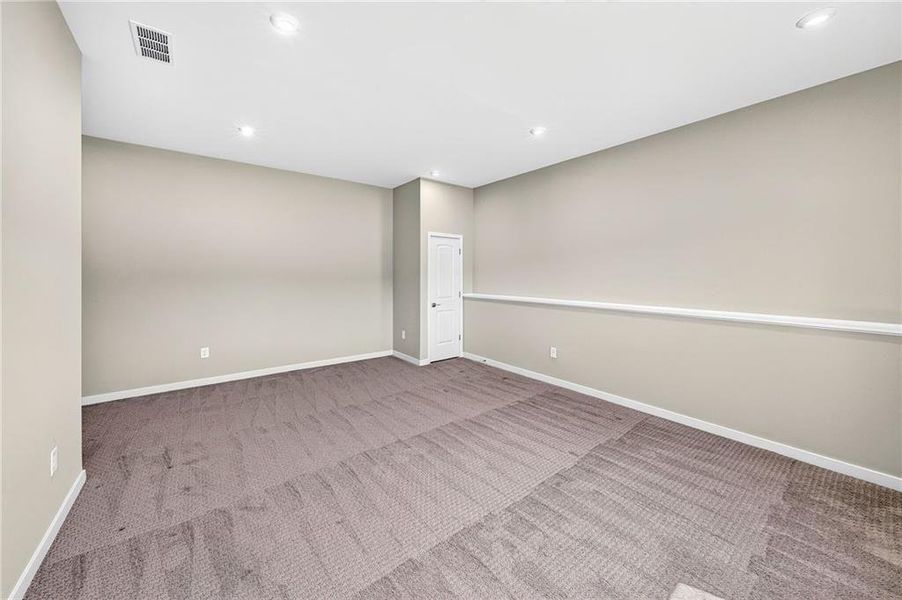 Spacious, unfurnished interior of a new home in The Reserve At Liberty Park, Braselton (Image 44).