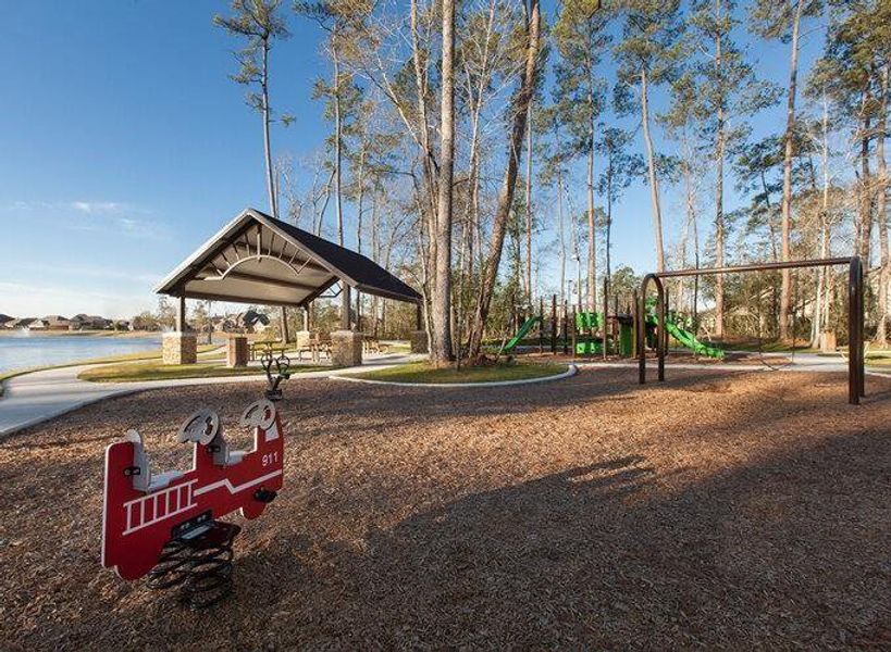 Enjoy family-friendly amenities with a well-equipped playground and a spacious picnic area, perfect for outdoor gatherings and fun. Enjoy family-friendly amenities with a well-equipped playground and a spacious picnic area, perfect for outdoor gatherings and fun.