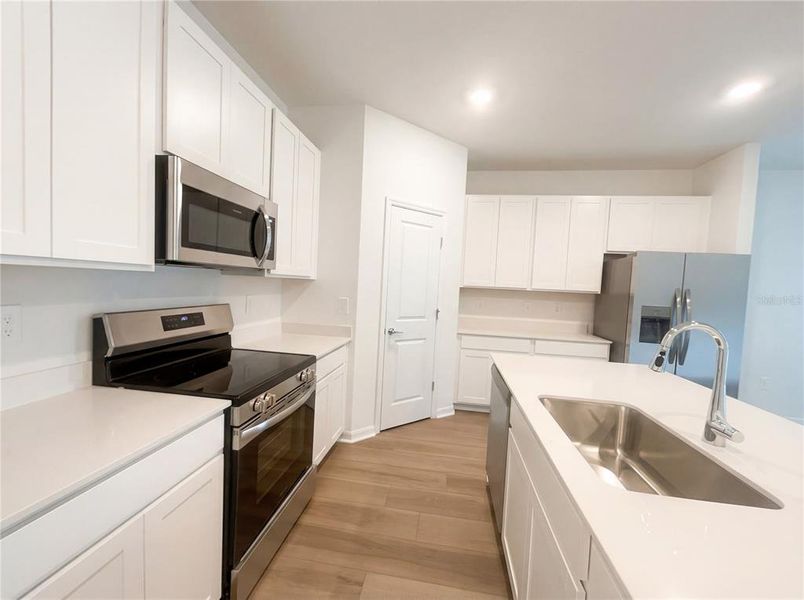 Furnished interior view inside a new home in Grand Park, Dunnellon (Image 8).