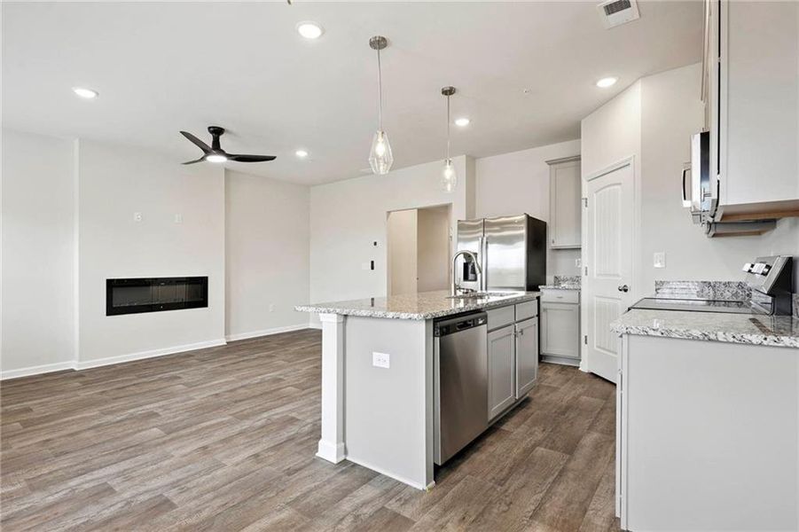 Furnished interior view inside a new home in The Enclave Townhomes, Hampton (Image 4).
