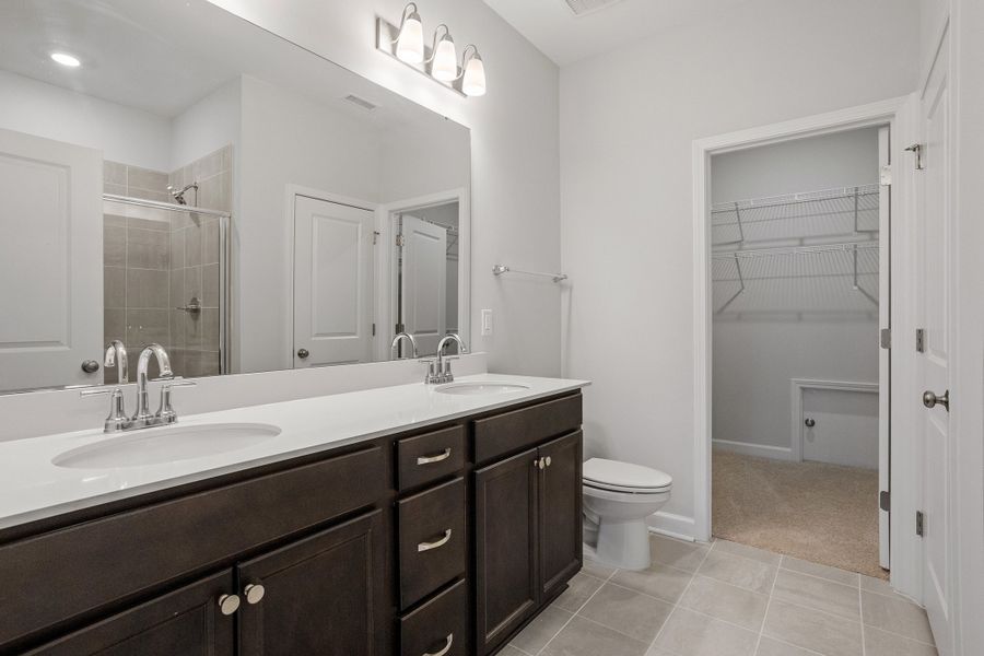 Furnished interior view inside a new home in Ovation at Sweetbrier, Durham (Image 12).