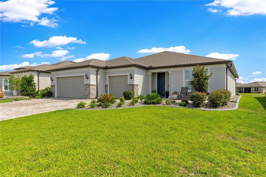 Front exterior of a new home in , Ocala, FL, highlighting curb appeal (Image 1). Front exterior of a new home in , Ocala, FL, highlighting curb appeal (Image 1).