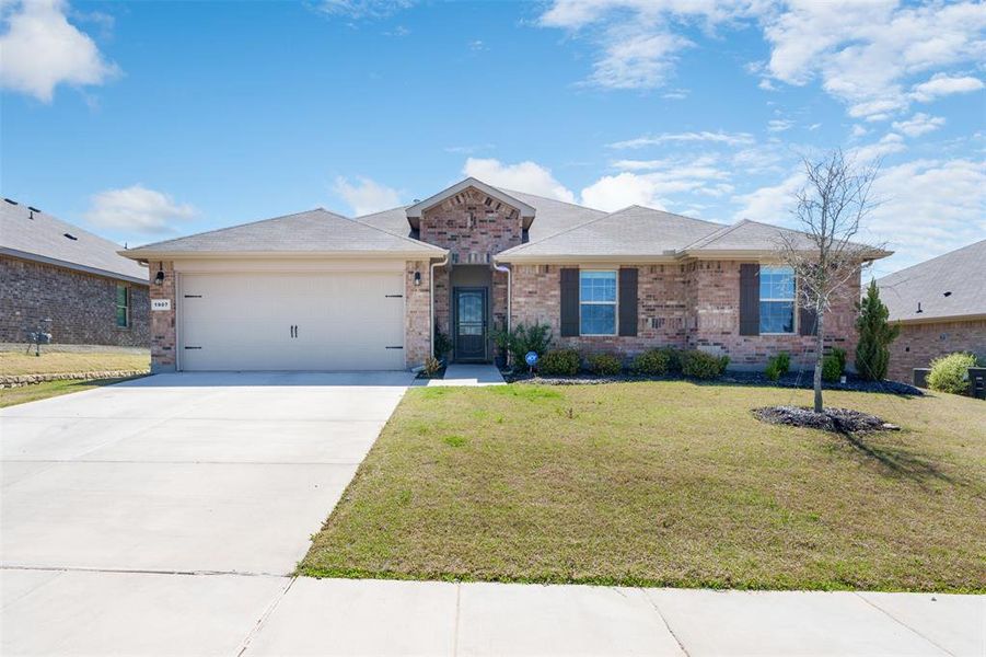 Front exterior of a new home in , Cleburne, TX, highlighting curb appeal (Image 23).