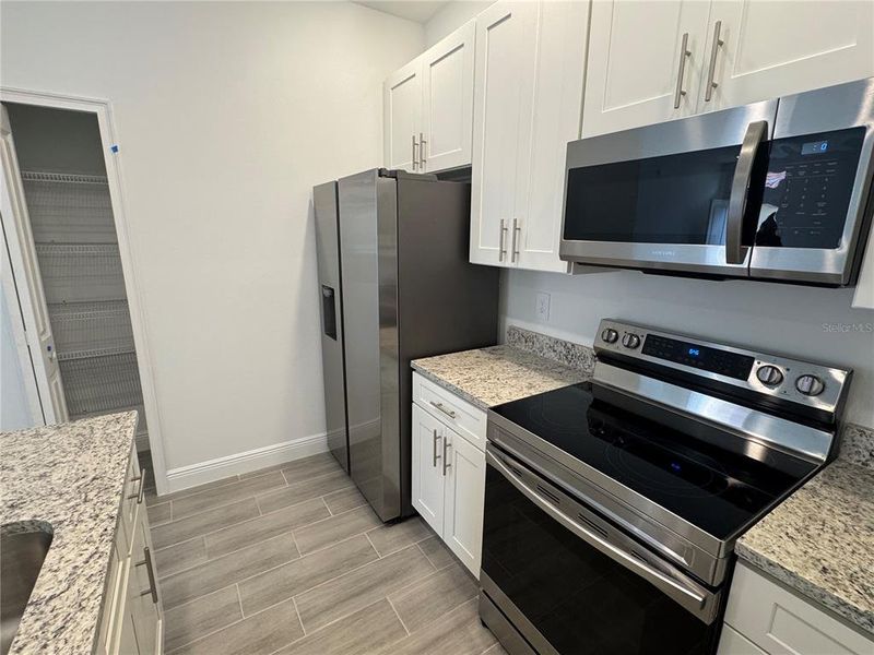 Furnished interior view inside a new home in , Poinciana (Image 4).