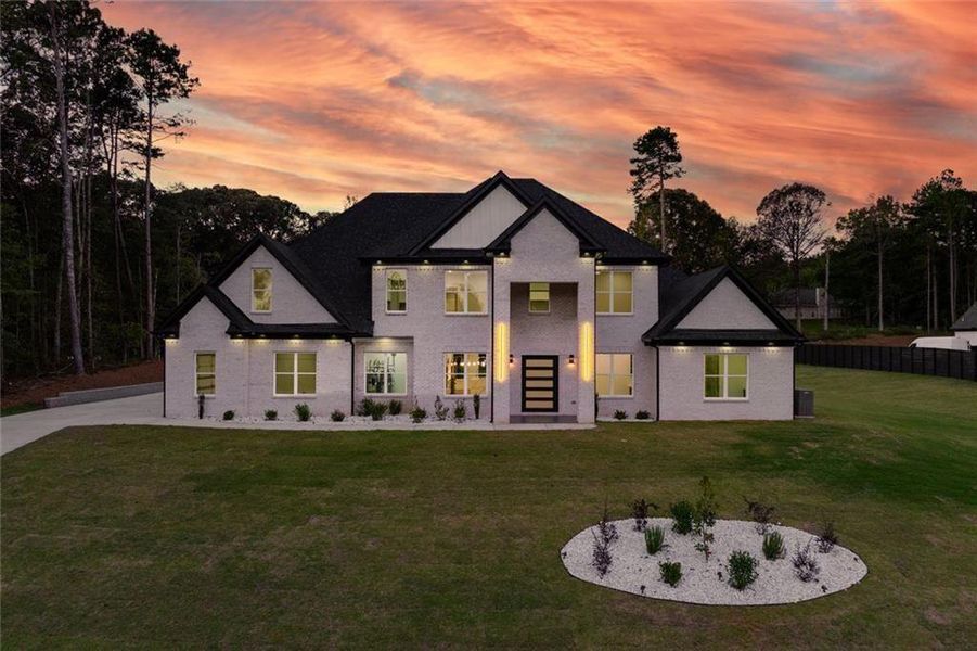 Front exterior of a new home in , Loganville, GA, highlighting curb appeal (Image 34).