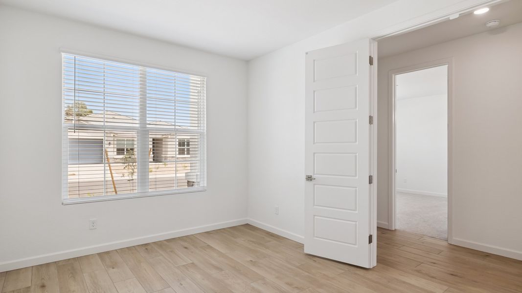 Spacious, unfurnished interior of a new home in Zanjero Pass, Waddell (Image 20).