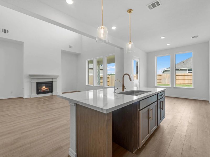 Kitchen island. Sample product photo. Actual exterior and interior selections may vary by homesite. Photo may be virtually staged. Kitchen island. Sample product photo. Actual exterior and interior selections may vary by homesite. Photo may be virtually staged.
